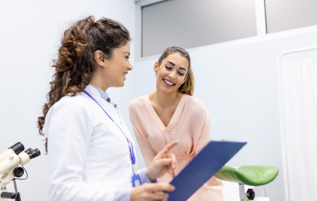 Photo of an OBGYN and patient during a women's health appointment for birth control planning.