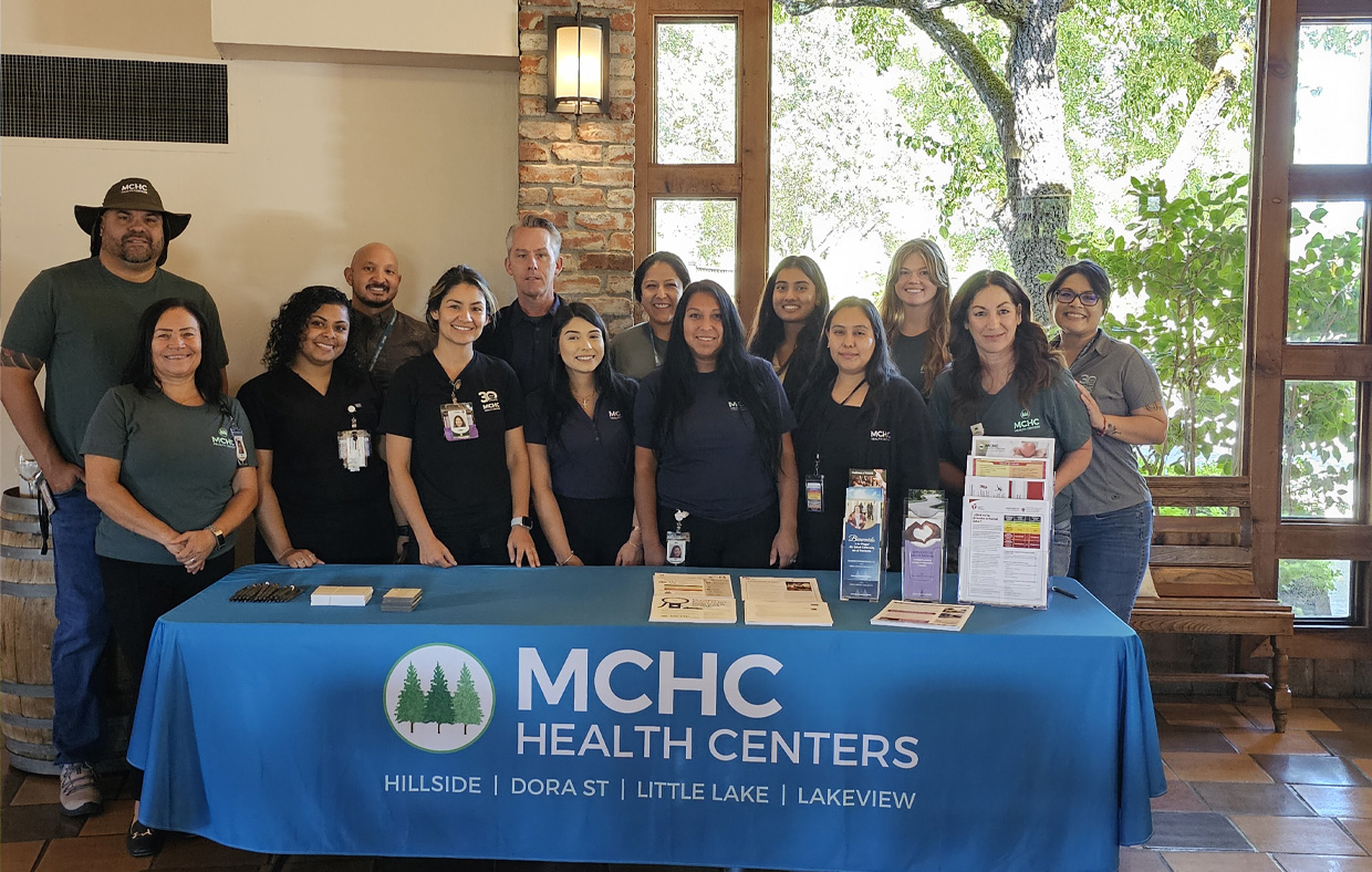 Photo of MCHC Health Centers staff duing a community outreach event.